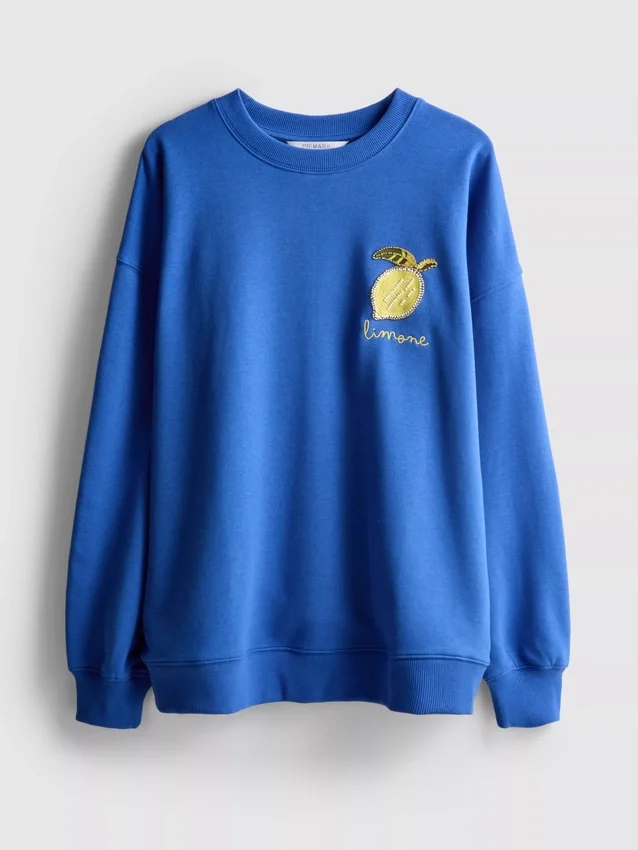 Afslappet sweatshirt i citronfarve med højt bomuldsindhold