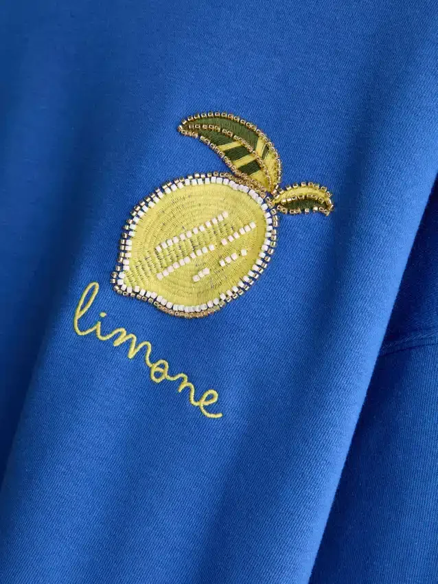 Afslappet sweatshirt i citronfarve med højt bomuldsindhold