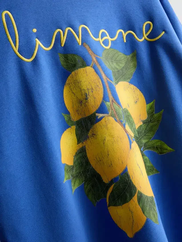 Afslappet sweatshirt i citronfarve med højt bomuldsindhold