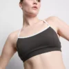 Aktiv crop-top med kontrastkant og krydsryg