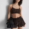 Aktiv crop-top med leopardmønster og racerback