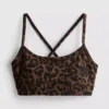 Aktiv crop-top med leopardmønster og racerback