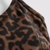 Aktiv crop-top med leopardmønster og racerback