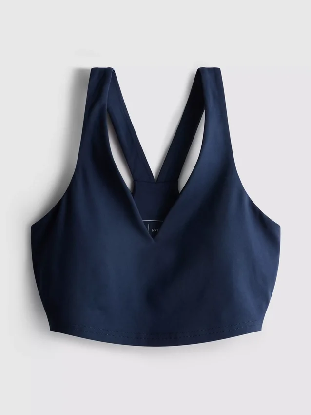 Aktiv crop-top med V-hals og racer-snit