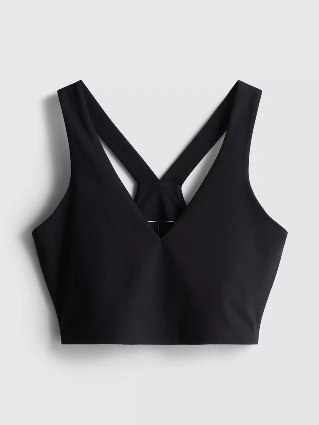 Aktiv crop-top med V-udskæring og glat pasform