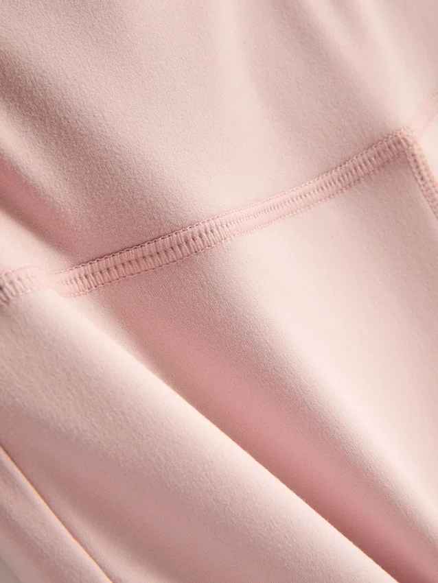 Aktive leggings med høj talje og udvidede ben