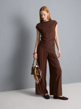 Asymmetrisk krøllet top