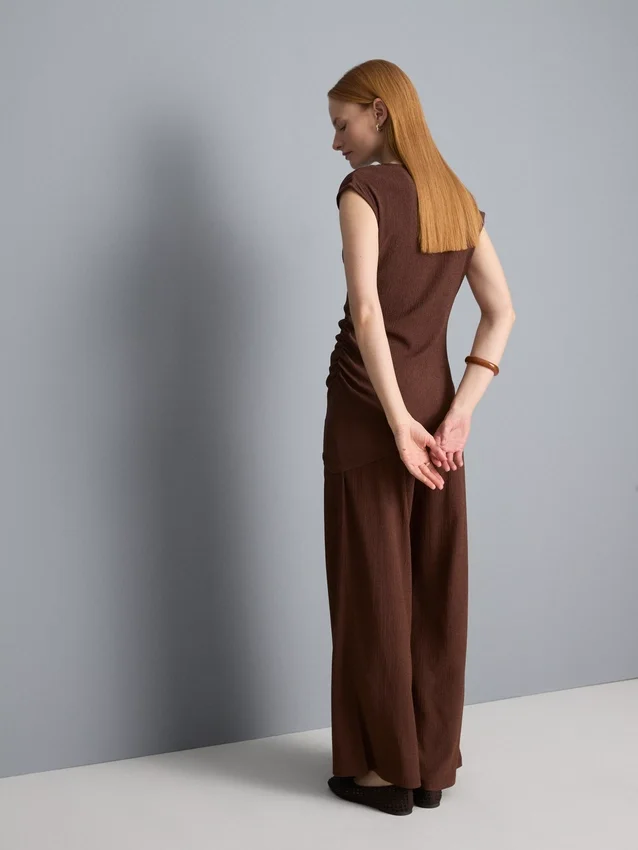 Asymmetrisk krøllet top