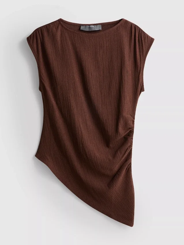 Asymmetrisk krøllet top