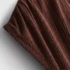 Asymmetrisk krøllet top