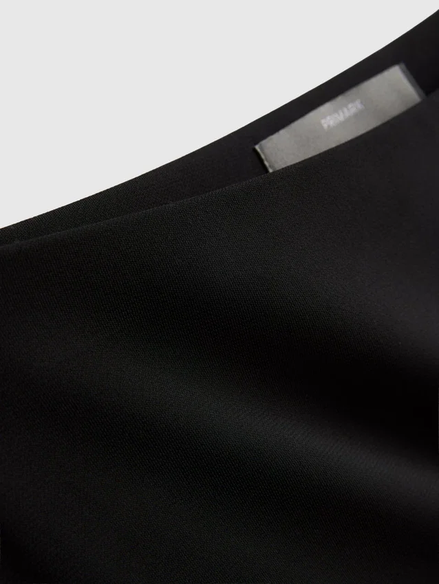 Asymmetrisk midi-nederdel i jersey