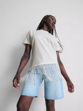 Asymmetrisk T-shirt i bomuld med frynser