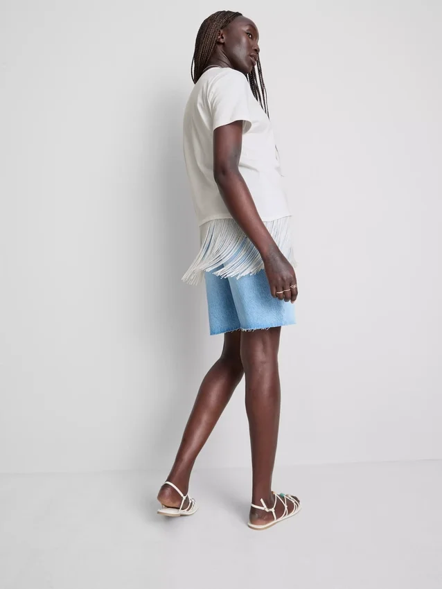 Asymmetrisk T-shirt i bomuld med frynser