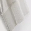 Asymmetrisk T-shirt i bomuld med frynser