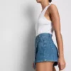 Asymmetrisk wrap-skort i bomuldsdenim