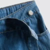 Asymmetrisk wrap-skort i bomuldsdenim