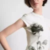 Baby-T-shirt i bomuld med blomsterprint