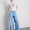 Baby-T-shirt med stolt hjerte i bomuldsrig blanding