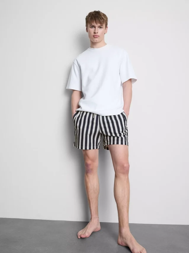 Badeshorts med striber i liggestolsstil