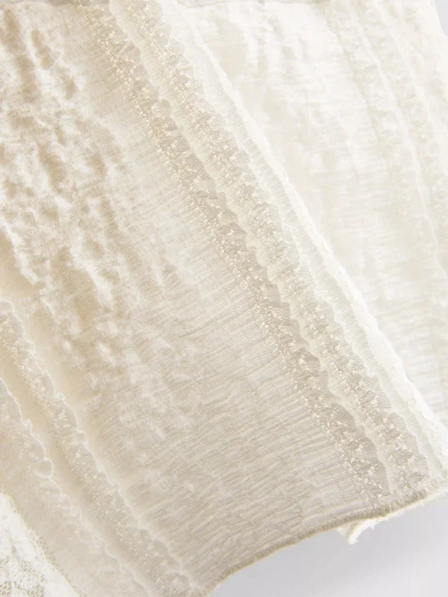 Bandeau-top i bomuldsblanding med blonder