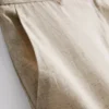 Bermudashorts i plisseret linneblanding