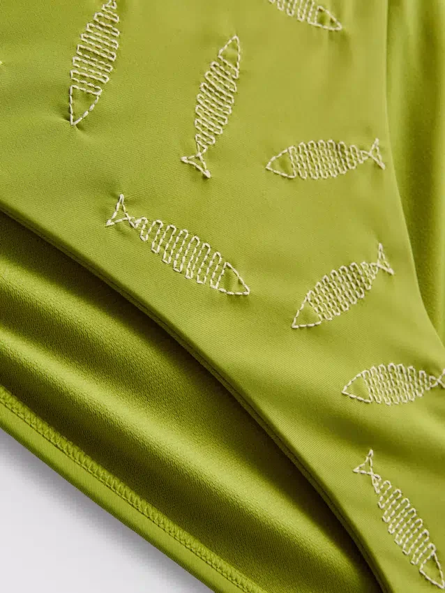 Bikinibukser med broderi og bindebånd i siden