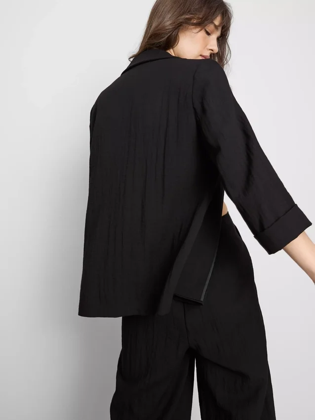 Blazer med struktur og skrå revers