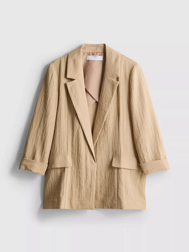 Blazer med struktur og skrå revers