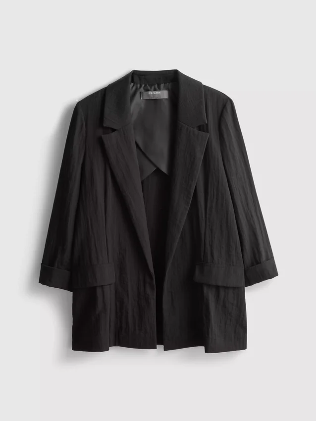 Blazer med struktur og skrå revers