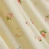 Blomsterprintet ribbet sovedragt