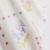 Blomstret pyjamaskjorte med korte ærmer