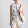 Bluse i bomuld med blomsterbroderi
