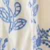 Bluse i bomuld med blomsterbroderi