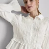 Bluse med rynket peplum-kant