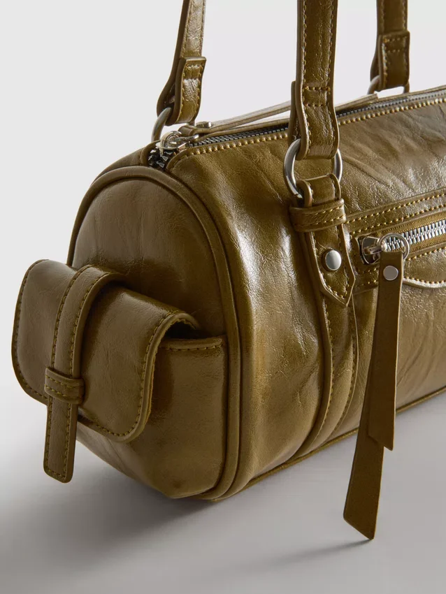 Bowler-taske i imiteret læder med distressed-look