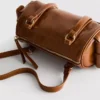 Bowler-taske i imiteret læder med distressed-look