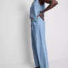 Bredbenede jeans i plisseret bomuldsdenim