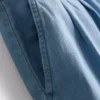 Bredbenede jeans i plisseret bomuldsdenim