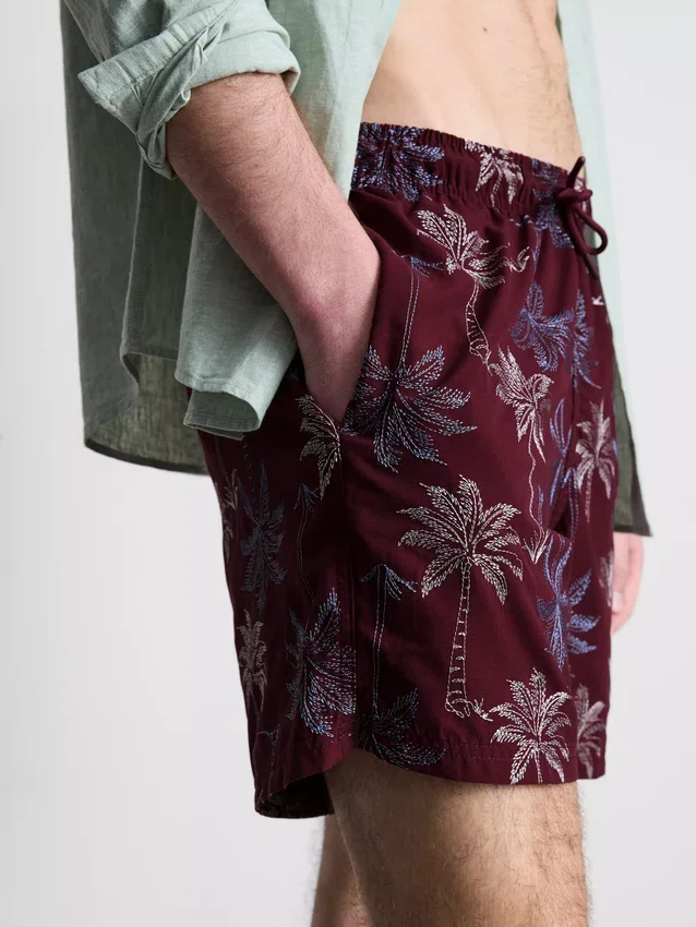 Broderede shorts med palmetræer