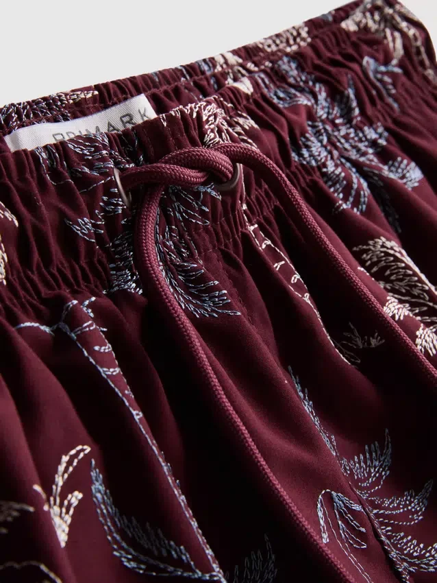 Broderede shorts med palmetræer