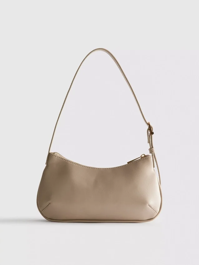 Buet skuldertaske i imiteret læder
