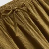 Bukser med krøllet struktur og brede ben