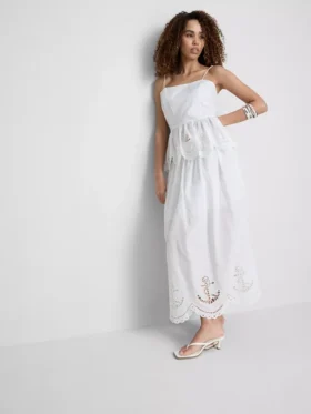 Cami-top i bomuld med broderet peplum-kant