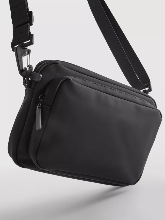 Crossbody-taske med lynlås