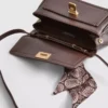 Crossbody-taske med tørklædedetaljer
