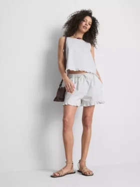 Denimshorts med flæser i bunden