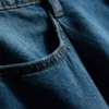 Denimshorts med plissering og udvidet ben i høj bomuldsandel