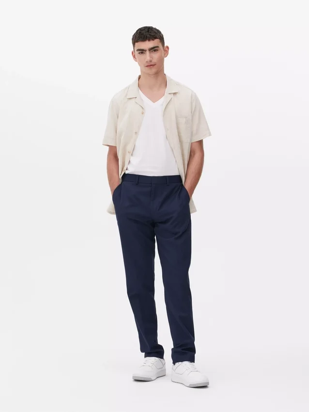 Formelle bukser i twill med slim fit