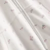 Hættetrøje med lynlås hele vejen ned og blomsterprint i bomuldsblanding