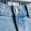Jeans i bomuldsdenim med høj talje og konisk snit